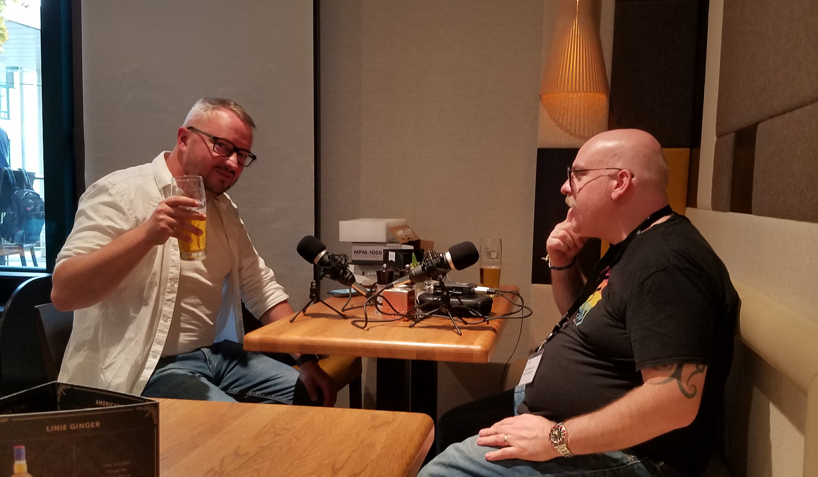 Rob Dudley and Mark Drew recording a podcast at CFCamp